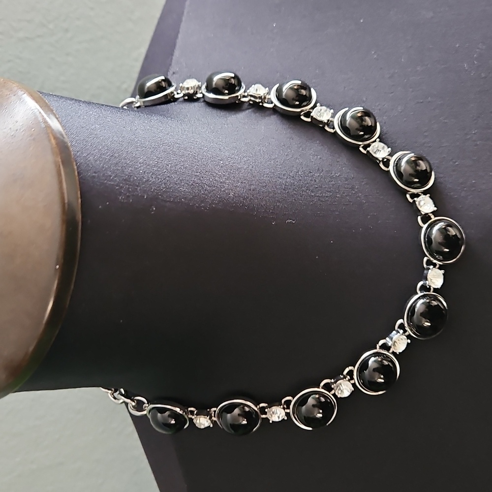 WHBM short necklace with black gemstones and clear crystals.